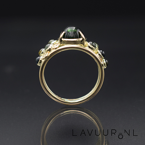 gouden ring met toermalijnen en topaas